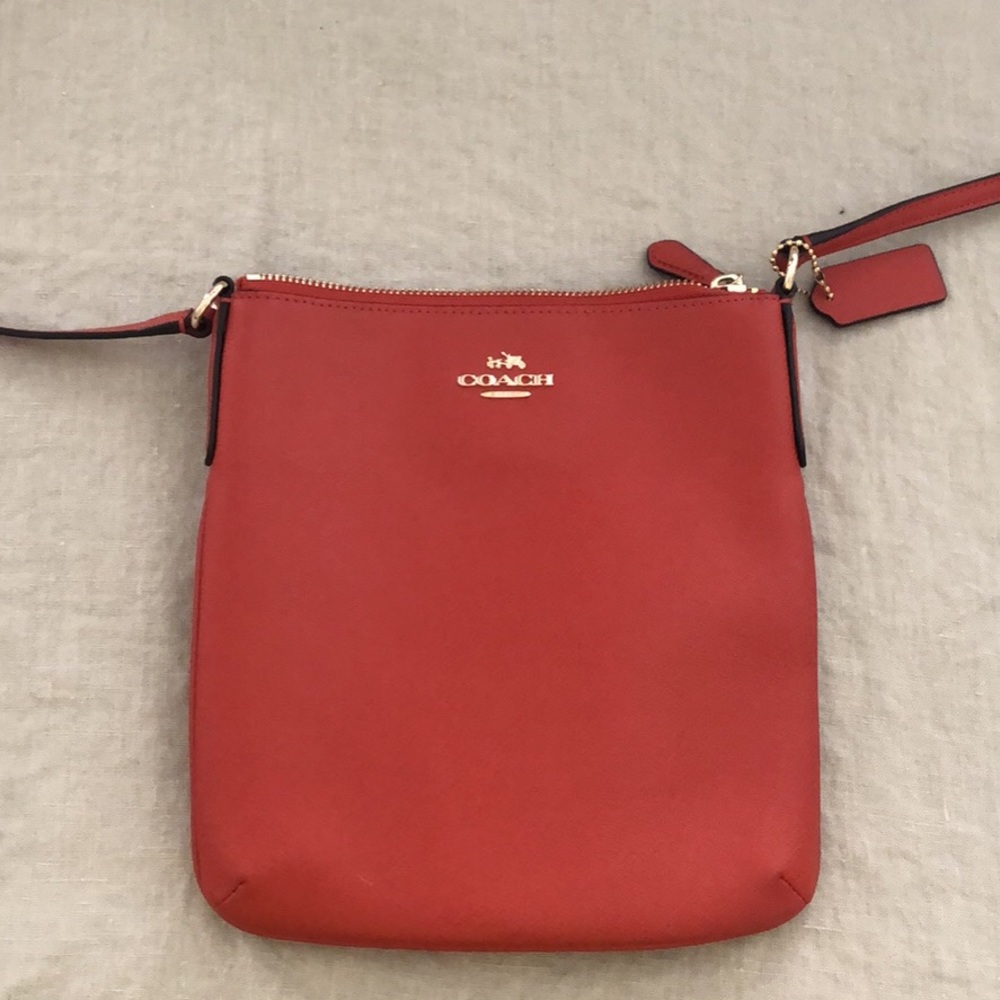 Red orange coach crossbody bag